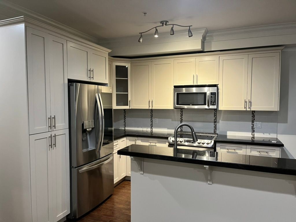 white cabinet job done on 1895 Dean Park Rd, Sidney BC